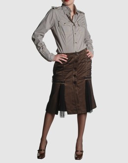 Gabardine - Tulle - Belt loops - Button closing - Two front pockets - Unlined - Contrasting applications - Embroidered logo - Drapped detailing -