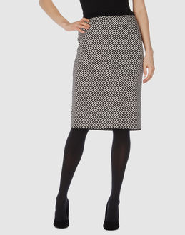 Christian Dior   Jupes au genou