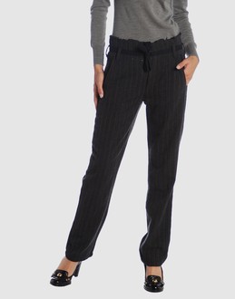 Woollen flanel - Pinstripe - Belt loops - Button, zip fly closure - Four pockets - Straight leg cut - Braided detailing -