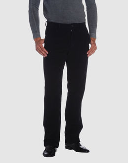 Velveteen - Belt loops - Button, zip fly closure - Four pockets - Unfinished hems - Rear logo -