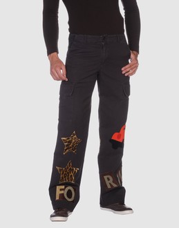 Cloth - Jacquard - Belt loops - Button, zip fly closure - Five pockets - Unfinished hems - Contrasting applications - Strap detailing -