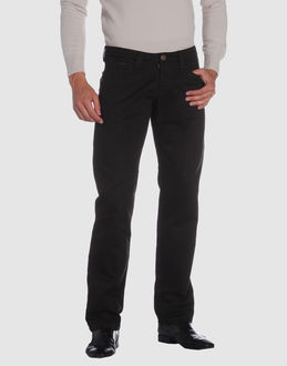 Gabardine - Leather - Belt loops - Button, zip fly closure - Multipockets - Straight leg cut - Studs - Stitch detailing -