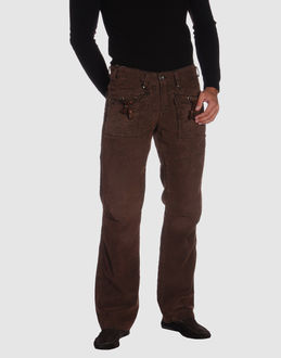 Velveteen - Leather - Belt loops - Button, zip fly closure - Multipockets - Straight leg cut - Tassels - Studs - Stitch detailing -