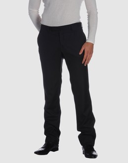 Wool voile - Low waisted - Hook-and-bar, zip fly closure - Four pockets - Straight leg cut - Unfinished hems - Stitched trimmed -