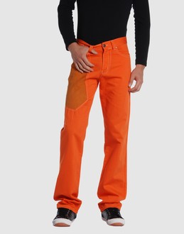 Leather - Cloth - Belt loops - Button, zip fly closure - Five pockets - Straight leg cut - Studs - Contrast stitched detailing - Logo details -
