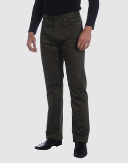 Cloth - Leather - Belt loops - Button, zip fly closure - Five pockets - Straight leg cut - Studs - Stitched trimmed -