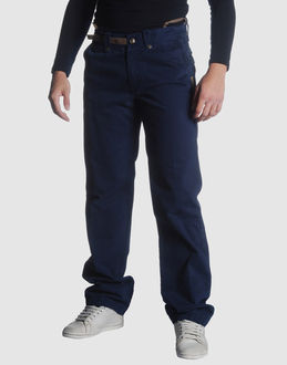 Gabardine - Belt loops - Button, zip fly closure - Four pockets - Strap detailing -