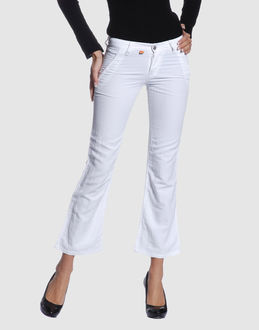 Cloth - Belt loops - Button closing - Four pockets - Bootleg cut - Stitched trimmed - Rear logo -