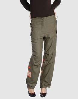 Woollen flanel - Drawstring waist - Button, zip fly closure - Two front pockets - Drawstring hemline - Contrasting applications - Boning -