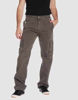 Gabardine - Belt loops - Snap-button, zip fly closure - Multipockets - Straight leg cut - Rear logo - Stitched trimmed - Studs -