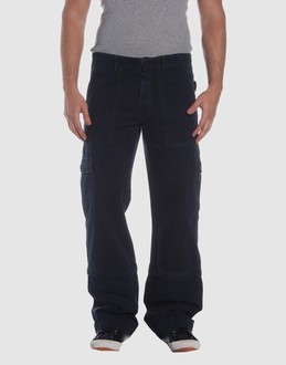 Cloth - Belt loops - Zip closure - Multipockets - Straight leg cut - Stitched trimmed - Rear logo -