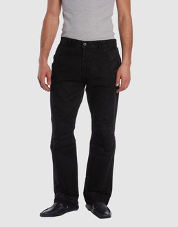 Cloth - Belt loops - Button, zip fly closure - Multipockets - Straight leg cut - Zip closing hemline - Appliqu? -
