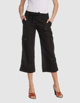Cloth - Belt loops - Button, zip fly closure - Multipockets - Bootleg cut - Shoe-string laces - Stitched trimmed -