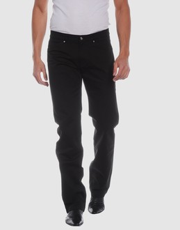 Gabardine - Belt loops - Button, zip fly closure - Four pockets - Rear logo - Studs - Stitch detailing -