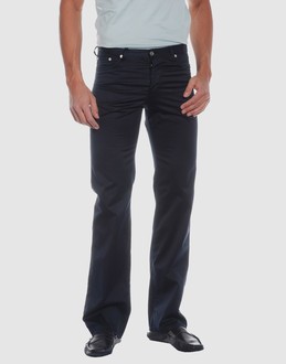 Cloth - Belt loops - Hidden buttons - Five pockets - Rear logo - Studs - Stitch detailing -
