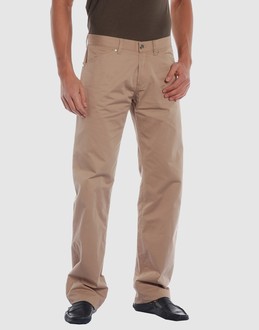 Cloth - Belt loops - Button, zip fly closure - Four pockets - Rear logo - Stitch detailing - Studs -