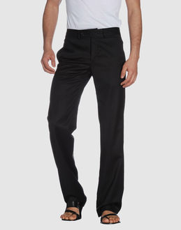 Wool voile - Belt loops - Hook-and-bar, zip fly closure - Four pockets - Straight leg cut - Unfinished hems - Stitch detailing - Boning -