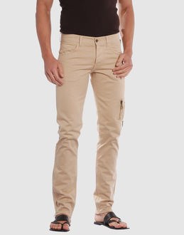 Gabardine - Belt loops - Button closing - Multipockets - Straight leg cut - Zip closing hemline - Detailed metallic inserts - Stitched trimmed -
