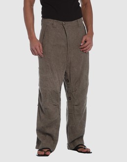 Cloth - High-rise waistline - Snap-button, zip fly closure - Four pockets - Wide leg cut - Detailed metallic inserts - Pleated detailing - Braided detailing -