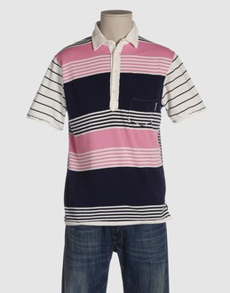 Jersey - Coin pocket - Button closing - Side slit hemline - Striped detailing - Logo details -