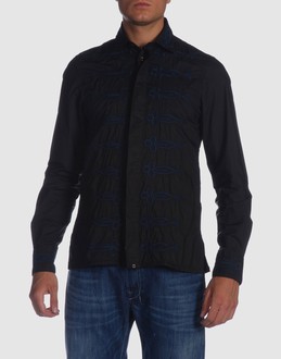 Cloth - Hidden buttons - Embroidery - Boning -