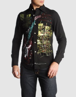 Cloth - Button closing - Detailed print - Rear logo - Frills -
