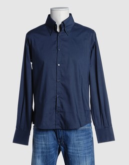 Cloth - Stretch - Button-down collar - Button closing - Pleated detailing -