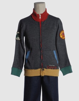 Light-weight knit - Mock neckline - Zip closure - Dual chest pockets - Embroidered logo - Contrasting applications - Raw cut - Dry cleanable - Iron at 110? c max - Handwashing recommended -