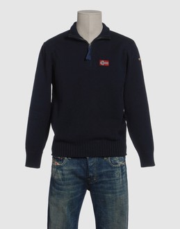 Finely ribbed jersey - Heavy-weight knit - Zip closure - Logo details -