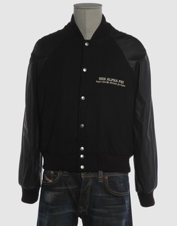 Woollen cloth - Ribbed jersey - Two pockets - Snap button closing - Elasticised waist - Lined interior - Embroidery - Contrasting applications - Detailed print -