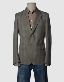 Prince of wales - Three pockets - Two internal jacket pockets - 2 buttons - Centred rear vent - Lined interior -