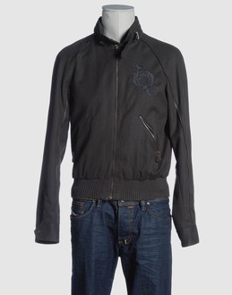 Jacquard - Cloth - Hooded neckline - Two pockets - One internal jacket pocket - Zip closure - Elasticised waist - Lined interior - Embroidery - Frills -