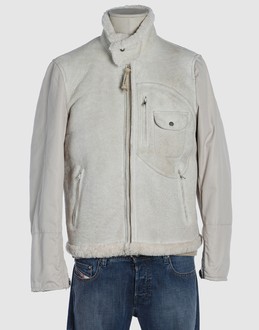 Sheepskin - Cloth - Fur trimmed collar - Three pockets - Zip closure - Stitched trimmed -