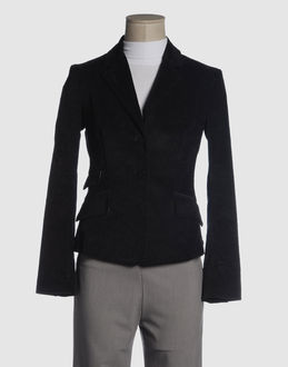 Velveteen - Three pockets - 3 buttons - Centred rear vent - Partially lined interior - Logo details -