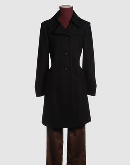 Woollen cloth - V-neckline - Two pockets - 3 buttons - Centred rear vent - Lined interior - Stitched trimmed -