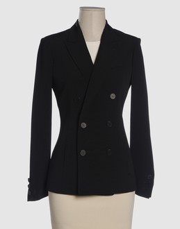 Tulle - Wool voile - Three pockets - Double-breasted closure - Centred rear vent - Lined interior - Boning - Detailed side seam stripes -