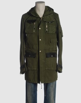 Gabardine - Leather - Hooded neckline - Strapped cuffs - Multipockets - Two internal jacket pockets - Snap-button, zip fly closure - Centred rear vent - Drawstring hemline - Lined interior - Contrasting applications - Rear logo -