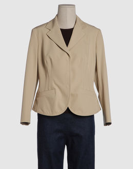 Gabardine - Stretch - Two pockets - Snap button closing - Lined interior - Boning - Stitch detailing -