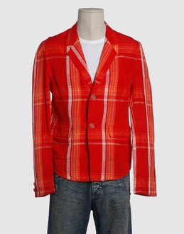 Tartan - Jacquard - Three pockets - Two internal jacket pockets - 2 buttons - Unfinished hems - Unlined - Stitched trimmed -