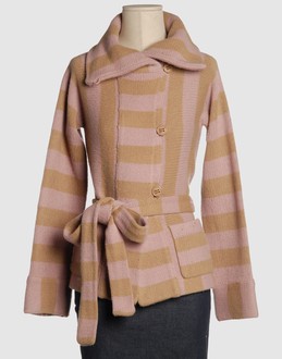 Heavy-weight knit - Inlay jersey - Turtleneck - Two pockets - Button closing - Unlined - Striped detailing - Belt attachment -