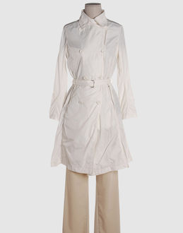 Techno fabric - Two pockets - Button closing - Belt loops - Rear slit - Unlined - Belt attachment - Stitch detailing -