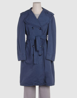 Canvas - Two pockets - 4 buttons - Belt loops - Rear slit - Unlined - Frills - Half-belt -