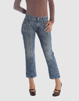 Denim cotton - Belt loops - Button, zip fly closure - Four pockets - Frayed hemline - Slashed detailing - Rear logo -