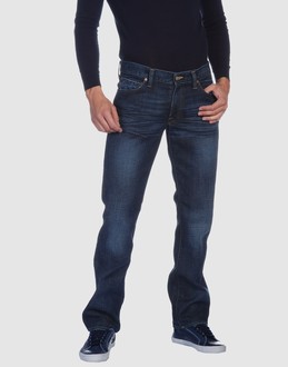 Denim cotton - Belt loops - Button, zip fly closure - Five pockets - Logo details - Contrast stitched detailing -
