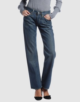 Denim cotton - Belt loops - Hidden buttons - Five pockets - Rear logo - Slashed detailing -