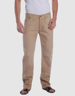 Denim cotton - Belt loops - Button closing - Five pockets - Straight leg cut - Slashed detailing - Rear logo - Studs -