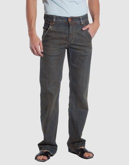 Denim cotton - Belt loops - Button, zip fly closure - Multipockets - Straight leg cut - Slashed detailing - Rear logo - Studs -