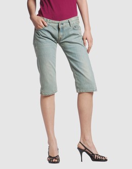 EVISU JEANS Pantaloni jeans su YOOX.COM
