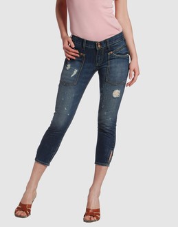 GURU JEANS Pantaloni jeans su YOOX.COM