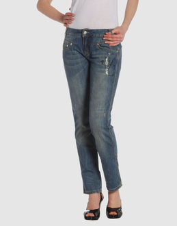 Denim cotton - Low waisted - Button, zip fly closure - Five pockets - Tapering leg cut - Diamante detailing - Slashed detailing - Studs -